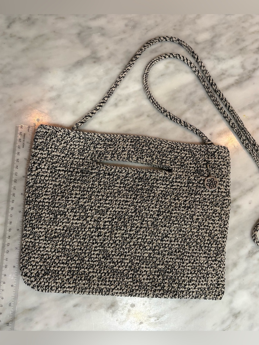 The Sak Woven Crossbody Bag in Black and Cream